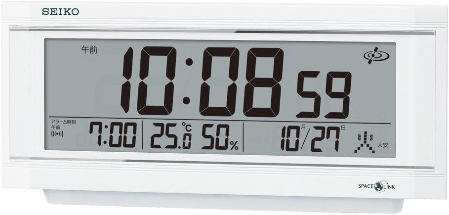 Reloj de mesa SEIKO SPACELINK GP501W con pantalla digital y funciones avanzadas.